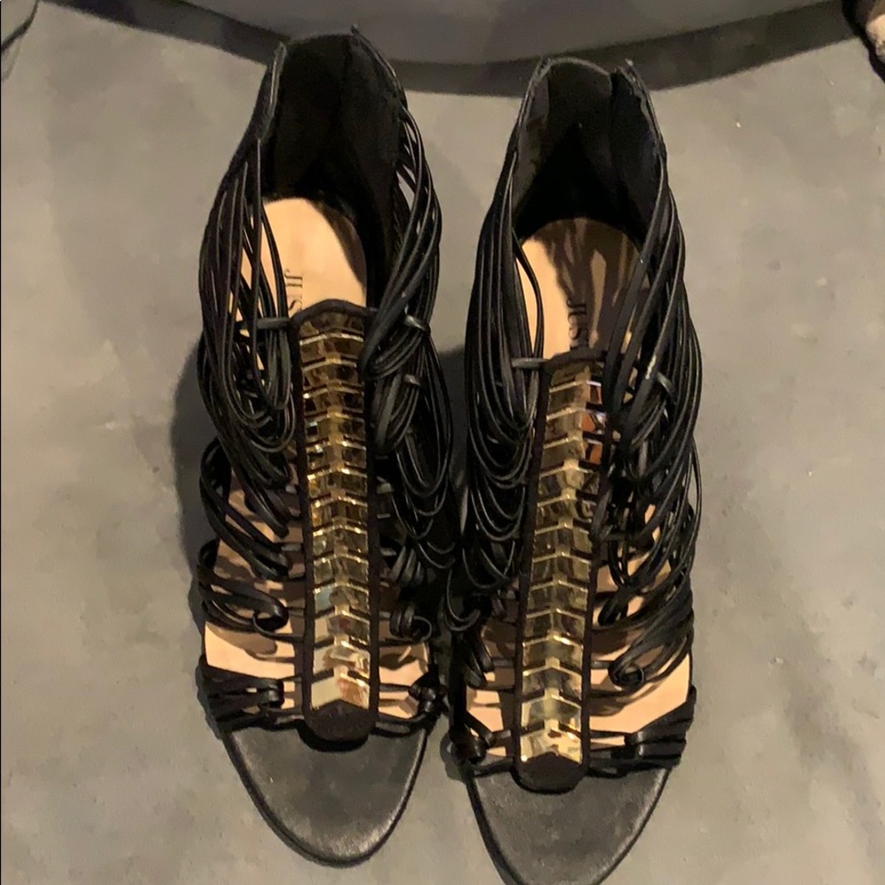 Black, high-heeled (very) shoes